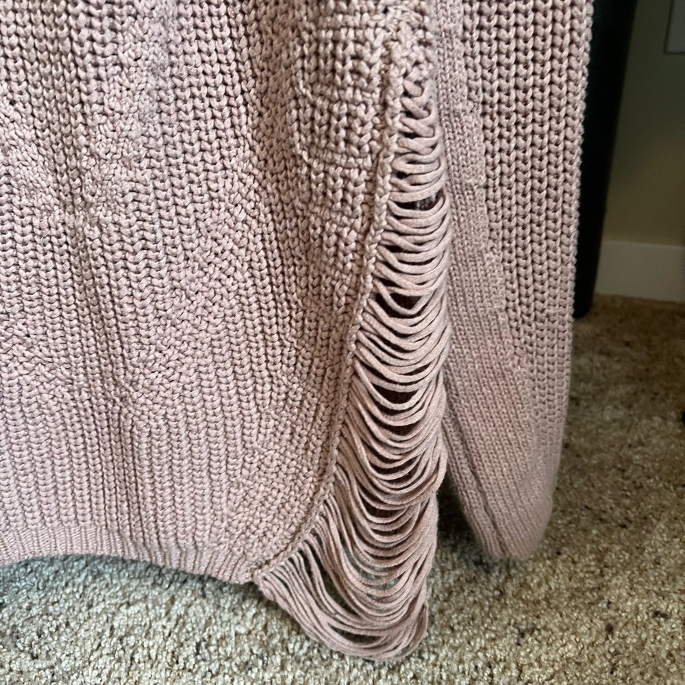 Sweater with cutouts